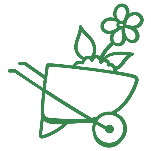 brouette avec feuilles, fleurs et herbe après l’entretien du jardin